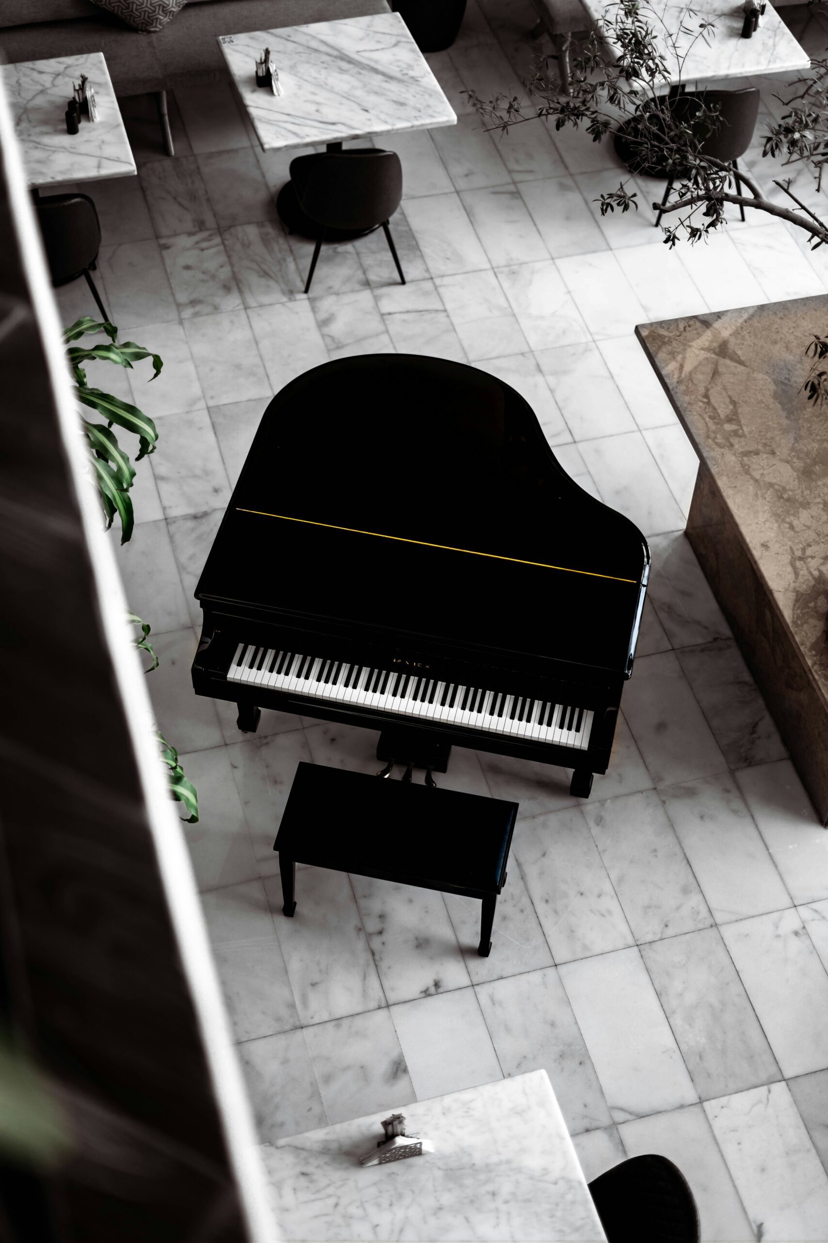 Baby grand piano being moved by professional piano movers in Kirkwood MO
