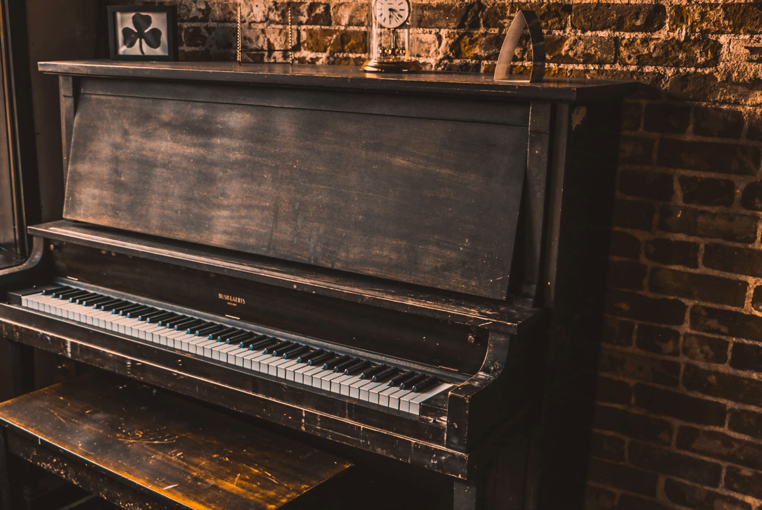 Upright piano ready for professional piano moving service in Kirkwood MO